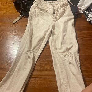 crème ripped mom jeans